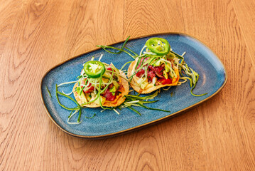 Classic tuna sandwich with homemade mayonnaise, fresh lettuce, and tomato slices, presented on lightly toasted ciabatta bread