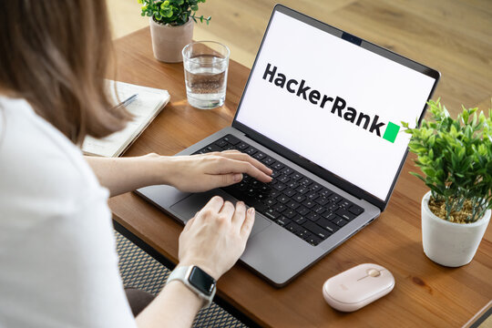 Poznan, Poland - August 23, 2025: HackerRank application on laptop screen, a person typing code, emphasizing online learning, skill development, and tech education
