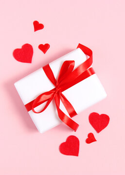 Gifts and hearts on a colored background top view. Love.. Vertical photo format