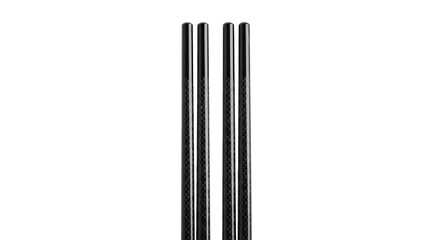 Two identical, sleek, deep black, highly polished carbon fiber chopsticks with intricate weave, parallel on a transparent background, diffused studio lighting, concept of modern culinary aesthetics