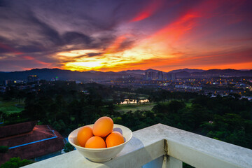 Fresh  eggs in a bowl with beautiful sunrise