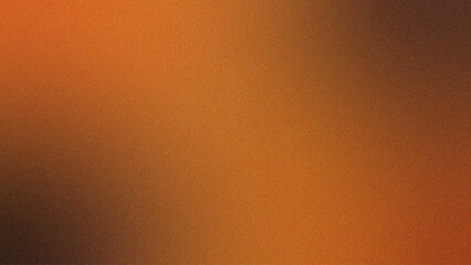 Abstract autumn gradient background with grain texture. Brown and orange blurry fall backdrop with...