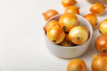Onion on the kitchen table. onion slice. onion rings. Fresh Yellow Onion. Natural, fresh, vegetarian food. Agricultural products. Healthy eating. Vegetables. Farmer's market. Space for text.Copy space