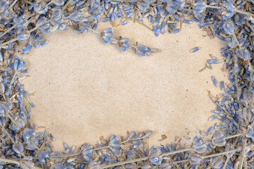 Artistic macro shot of lavender bouquet forming rustic flower frame on kraft paper