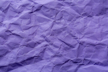 Close-up macro of wrinkled purple paper texture,Abstract light purple paper texture background. Texture of crumpled craft paper. Paper background. Recycled violet paper backdrop in close up.