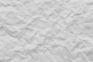 Close-up macro of crumpled white paper texture,Wrinkled and crumpled white paper texture. Perfect as a background for design, art, and creative projects.