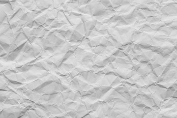 Close-up macro of crumpled white paper texture,Wrinkled and crumpled white paper texture. Perfect as a background for design, art, and creative projects.
