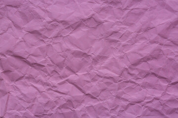 Close-up macro of crumpled pink paper texture,Abstract light pink paper texture background. Texture of crumpled craft paper. Paper background. Recycled pink paper backdrop in close up. Pink Textures. 