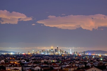 Distant City Landscape with Dramatic Clouds at Dusk