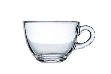 A clear glass cup is sitting on a table. The cup is empty and has a handle. Concept of emptiness and simplicity, as the cup is devoid of any contents