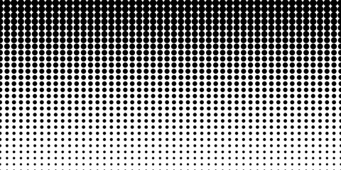 Black dots of varying sizes randomly scattered on a white background creating a polka dot pattern  comic pop art overlay backdrop. Halftone raster effect wallpaper. modern