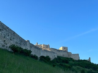 Obraz premium Majestic medieval fortress Spiš Castle or Spišský hrad against the blue sky, Spišské Podhradie, Prešov, Slovakia, May 2024