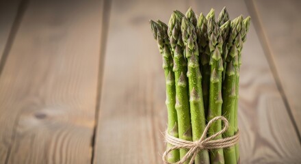 Freshly picked asparagus spears tied with twine for a healthy spring recipe idea