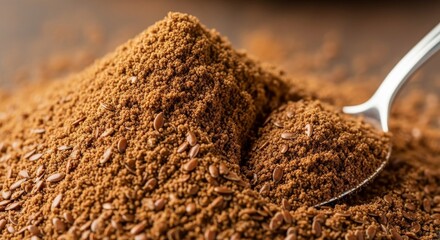 Ground flaxseed with spoon for healthy eating and dietary fiber nutrition boost