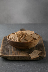 Crackers and Crispbreads in Wooden Bowl