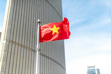 The Vietnamese flag on a flag pole at Toronto City Hall’s Nathan Phillips Square.