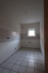 Bathroom with a window and a door