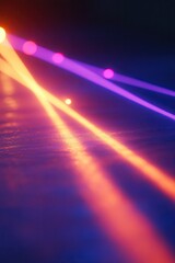 Vibrant, dynamic light beams crisscrossing a dark surface