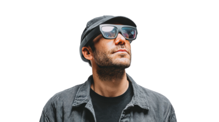 Stylish man wearing glasses and a hat, looking up thoughtfully against a white isolated background.