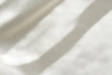 Soft, white fabric draped with subtle shadows