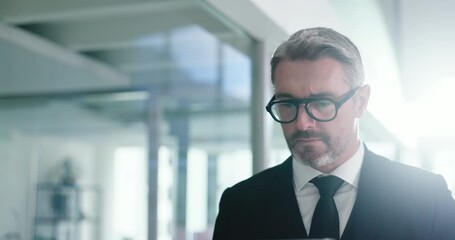 Walking, businessman and serious with tablet, office or browse for investment opportunity on website. Online, investor and mature person with tech for financial report, review or stock market updates - Powered by Adobe