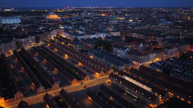Aerial drone view over the historic Nyboder houses with Frederiks Church visible, in Copenhagen, Denmark