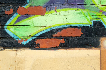 graffiti on a brick wall