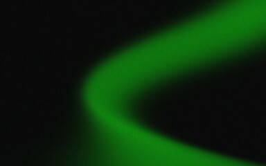 Abstract, blurry, vibrant green arc against a dark background
