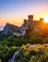 Sunrise over a mountaintop castle