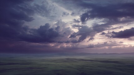 Fototapeta premium Serene expansive landscape under vast sky with dark and light purple hues,