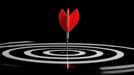 Sharp red dart striking the center of a black and white target, emphasizing precision and focus in the game of darts