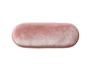Oval-shaped, blush-pink velvet eyeglass case