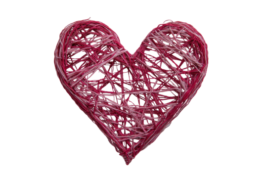 Heart-shaped wicker craft, with pink and white woven strands forming a textured heart shape against a black background