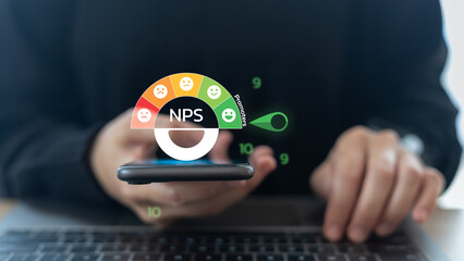 Businessman using a smartphone with the NPS Net Promoter Score gauge dashboard. Customer feedback, survey, satisfaction, loyalty, rating, and digital business performance analysis concept.