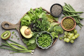 Superfood. Different healthy products on light grey table, flat lay