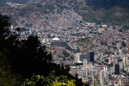 Neighborhoods and residential areas in downtown Caracas. El Helicoide. Views along the &Aacute;vila Hiking Trail