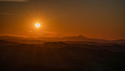 Marche, spectacular view and sunset on the Marche hills from the Ripatransone viewpoint.