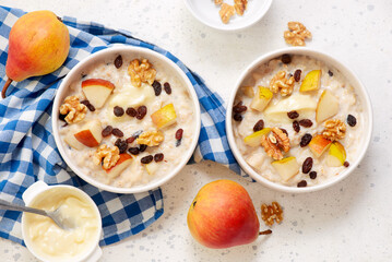 Oatmeal with pears, walnuts and raisins.top veiw