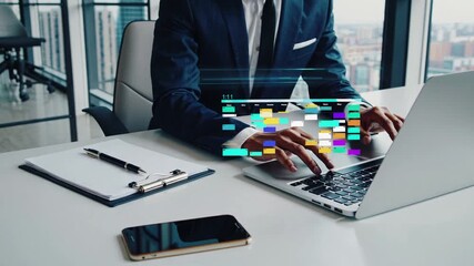Business professional working on a laptop with digital data overlays in a modern office setting in the city - Powered by Adobe