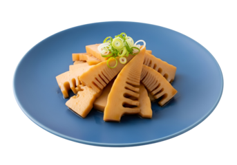 Slices of marinated bamboo shoots, arranged artfully on a vibrant blue plate, with a touch of green onions.