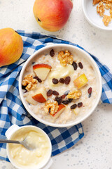 Oatmeal with pears, walnuts and raisins.top veiw