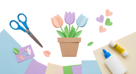 Photo of craft supplies including scissors, glue, and paper tulips, with colorful hearts and paper scraps, isolated on transparent background