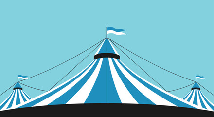 Obraz premium A classic blue and white striped circus tent under a clear sky