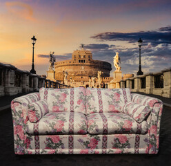 divano al tramonto con  sfondo castel sant angelo roma