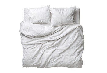 Obraz premium High-angle view of a white bed with rumpled sheets and pillows