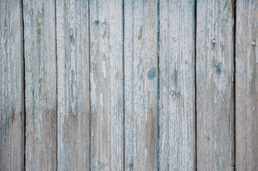 Wooden plank background with peeling red blue