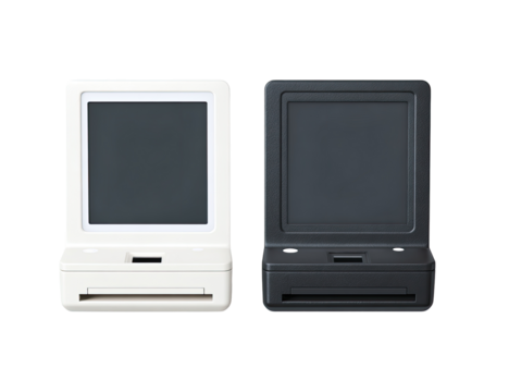 Two small, square devices, one white and one black,  stand side-by-side.  Each has a flat screen and a small, rectangular, print/output area.  The devices are likely portable photo printers or similar