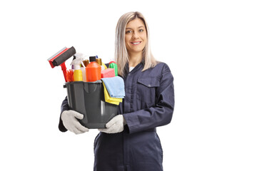 Female professional cleaner holding a bucket with cleaning supplies