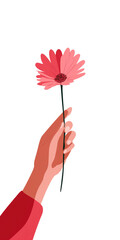 A hand holds a vibrant pink flower