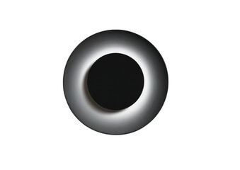 Circular, light-toned ring encircles a dark center.  The ring has a recessed inner edge, creating a layered effect